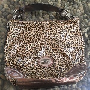 KATHY VAN ZEELAND  leopard print bag.